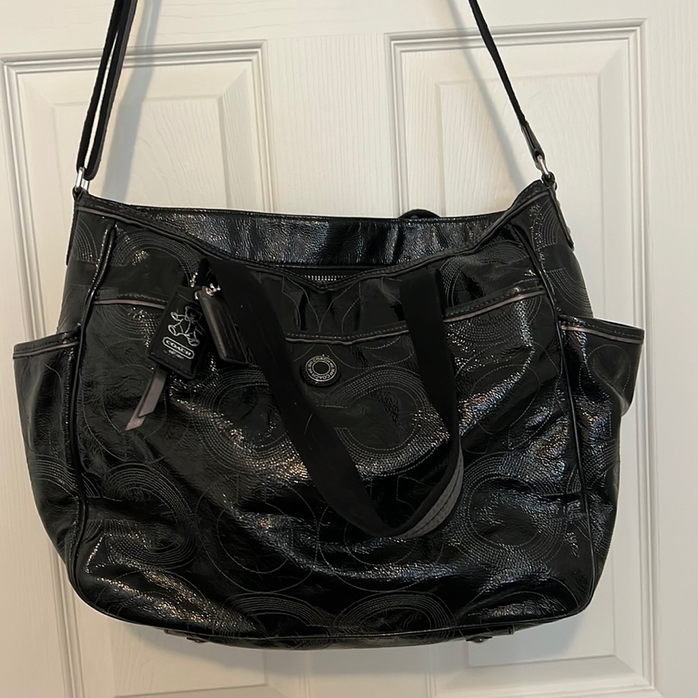 Coach diaper bag with changing pad
